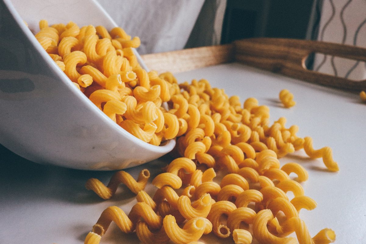 macaroni falling out of a bowl